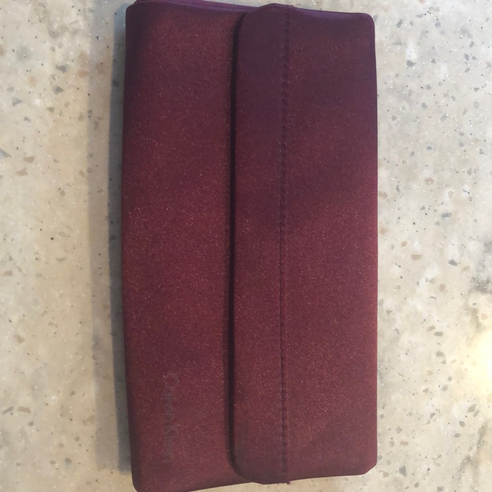 Calvin Klein clutch.  Cranberry satin.